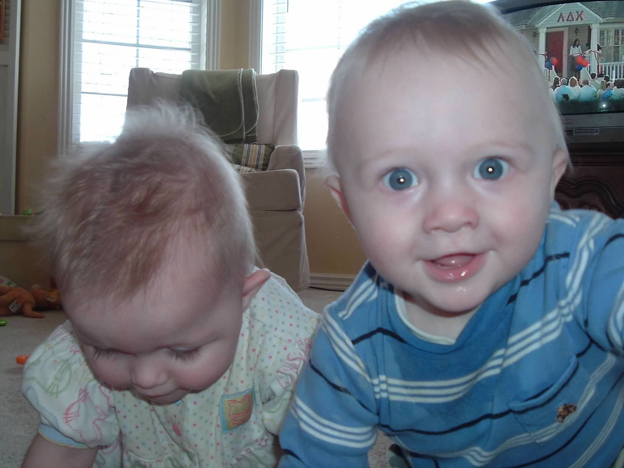 Baby Bryan and his sister pose for a selfie.